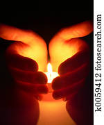 Hands and a candle Hands and a candle