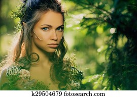 Elf woman in a magical forest Elf woman in a magical forest