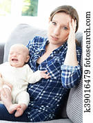 Frustrated Mother Suffering From Post Natal Depression Frustrated Mother Suffering From Post Natal Depression