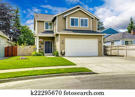 Two story house exterior with front yard landscape