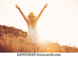 Happy Young Woman Outdoors at Susnet. Fashion Lifestyle.