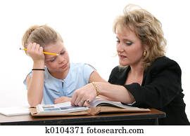 Teacher Helping Student at Desk Teacher Helping Student at Desk