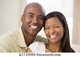 Couple in living room smiling