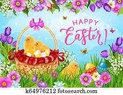 Easter eggs, chicks and flowers in basket Easter eggs, chicks and flowers in basket