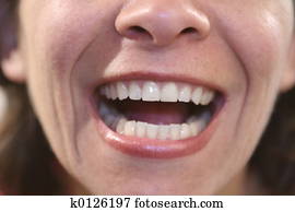 mujer, mostrar dientes