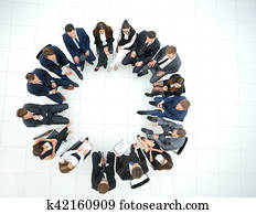 Staff discussing in a formal setting