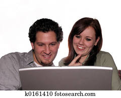 Couple with laptop on white