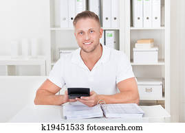Businessman working at his desk in the office