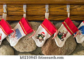 Christmas Stockings on the Mantle Stock Image | k0475322 | Fotosearch