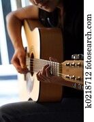 Playing guitar Playing guitar