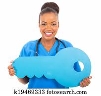 african medical doctor with key symbol