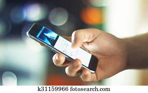 Business Man using Apple iPhone 6s in Office Business Man using Apple iPhone 6s in Office