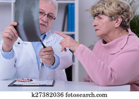 Practitioner analyzing chest x-ray