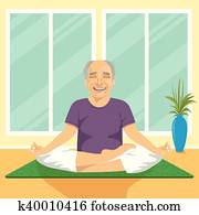 senior man doing yoga exercises in lotus position sitting on mat