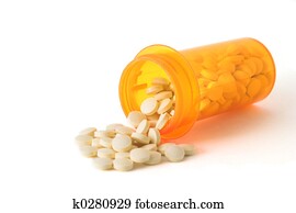 Close-up View of medicine spilling from bottle Close-up View of medicine spilling from bottle