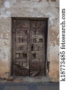 ancient door in typical spanish street, rural scene ancient door in typical spanish street, rural scene