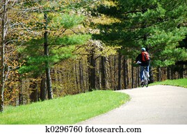 Cycling in a park Cycling in a park