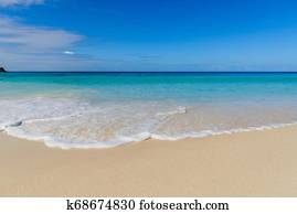Waves and foam on Seychelles paradise beach Waves and foam on Seychelles paradise beach
