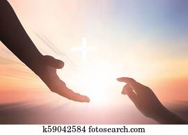 Unity concept:silhouette of helpping hand and hope concept and international day of peace Unity concept:silhouette of helpping hand and hope concept and international day of peace