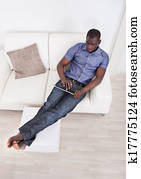 African Man In Living Room