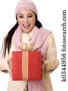 Delightful Surprise - Female holding a large red and gold gift