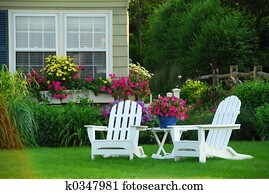 Two lawn chairs Two lawn chairs