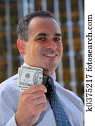 Businessman hold money