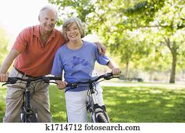 Senior couple on bicycles