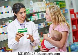 Pharmacy chemist, mother and child in drugstore Pharmacy chemist, mother and child in drugstore
