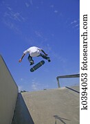 Skateboarder Jumping a Rail Skateboarder Jumping a Rail