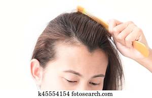 Woman serious hair loss problem for health care shampoo and beauty product concept Woman serious hair loss problem for health care shampoo and beauty product concept