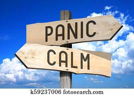 Panic, calm - wooden signpost Panic, calm - wooden signpost