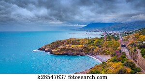 Rain clouds over the northern coast of Sicily near Palermo