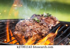 Beef steaks on grill Beef steaks on grill