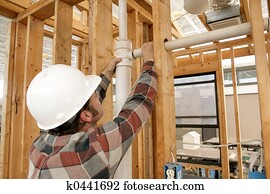 Construction Worker Connecting Pipe Construction Worker Connecting Pipe