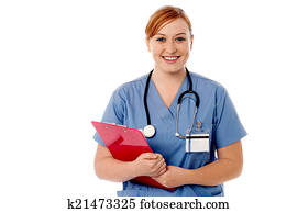 Young female nurse holding clipboard