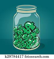 Glass jar with money.