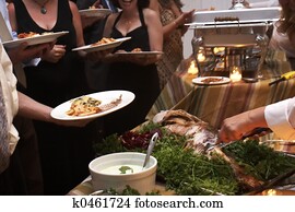 dinner being served at a wedding