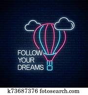 Follow your dreams - glowing neon inscription phrase with hot air balloon sign. Motivation quote in neon style. Follow your dreams - glowing neon inscription phrase with hot air balloon sign. Motivation quote in neon style.