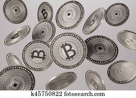 Close up of silver bitcoins tossed into the air as example for blockchain and crypto-currency concept Close up of silver bitcoins tossed into the air as example for blockchain and crypto-currency concept