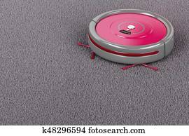 Robot vacuum cleaner on the carpet Robot vacuum cleaner on the carpet