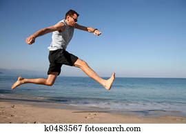 mann springen, strand