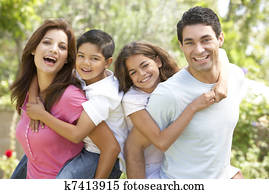 Portrait of Happy Family In Park Portrait of Happy Family In Park