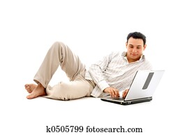 relaxed man with laptop
