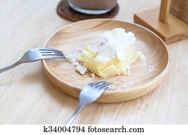Soiled cake plate on  table