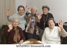 senior women at the game table
