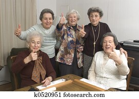 senior women at the game table