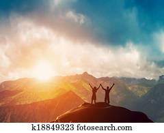 A happy couple together on mountain