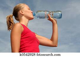 woman drinking water woman drinking water