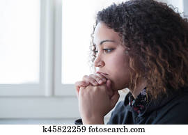 Alone and lonely young girl feeling depressed